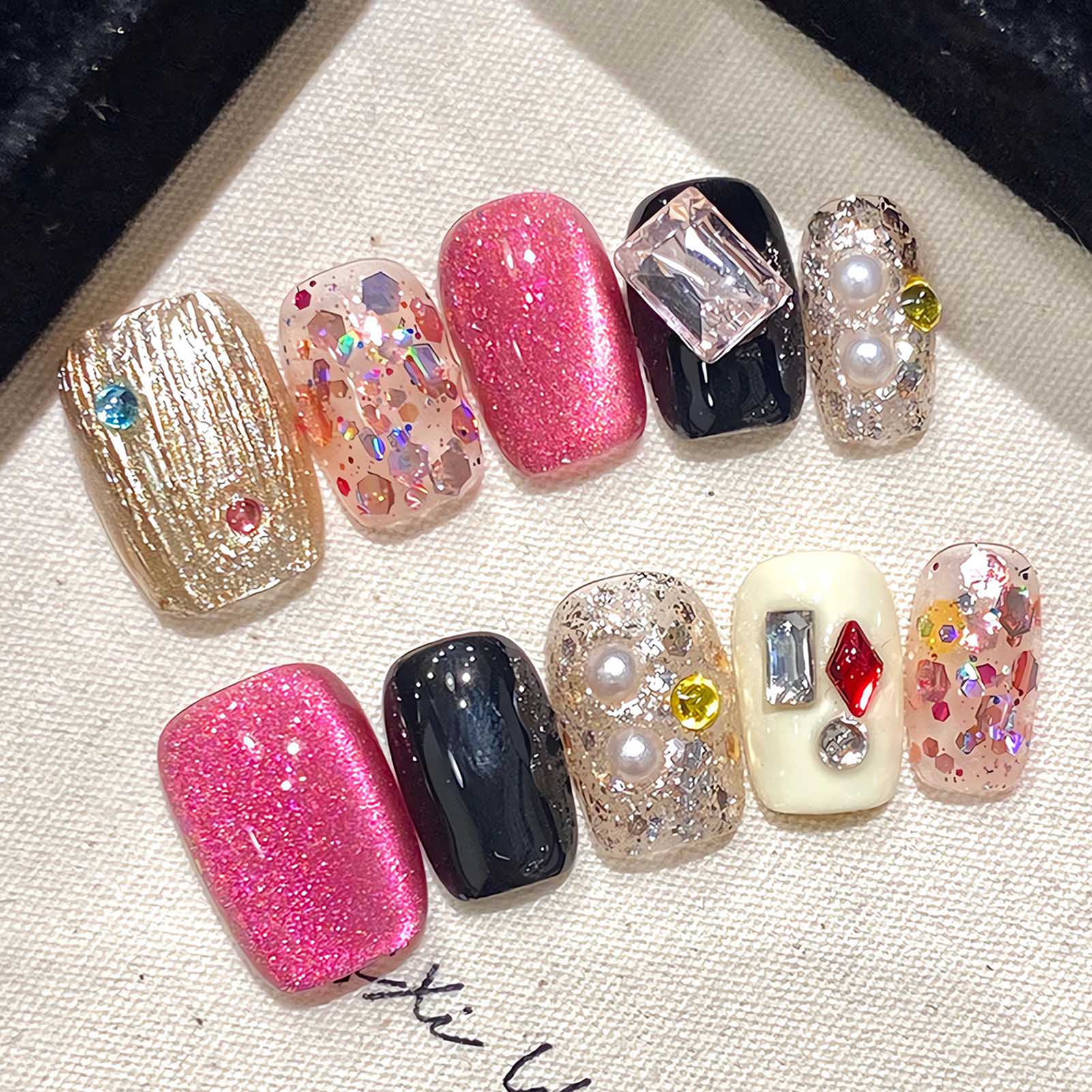 أظافر بالضغط مصنوعة يدويًا ، ت - مراجعة Nail Art Cat Eye وسعره